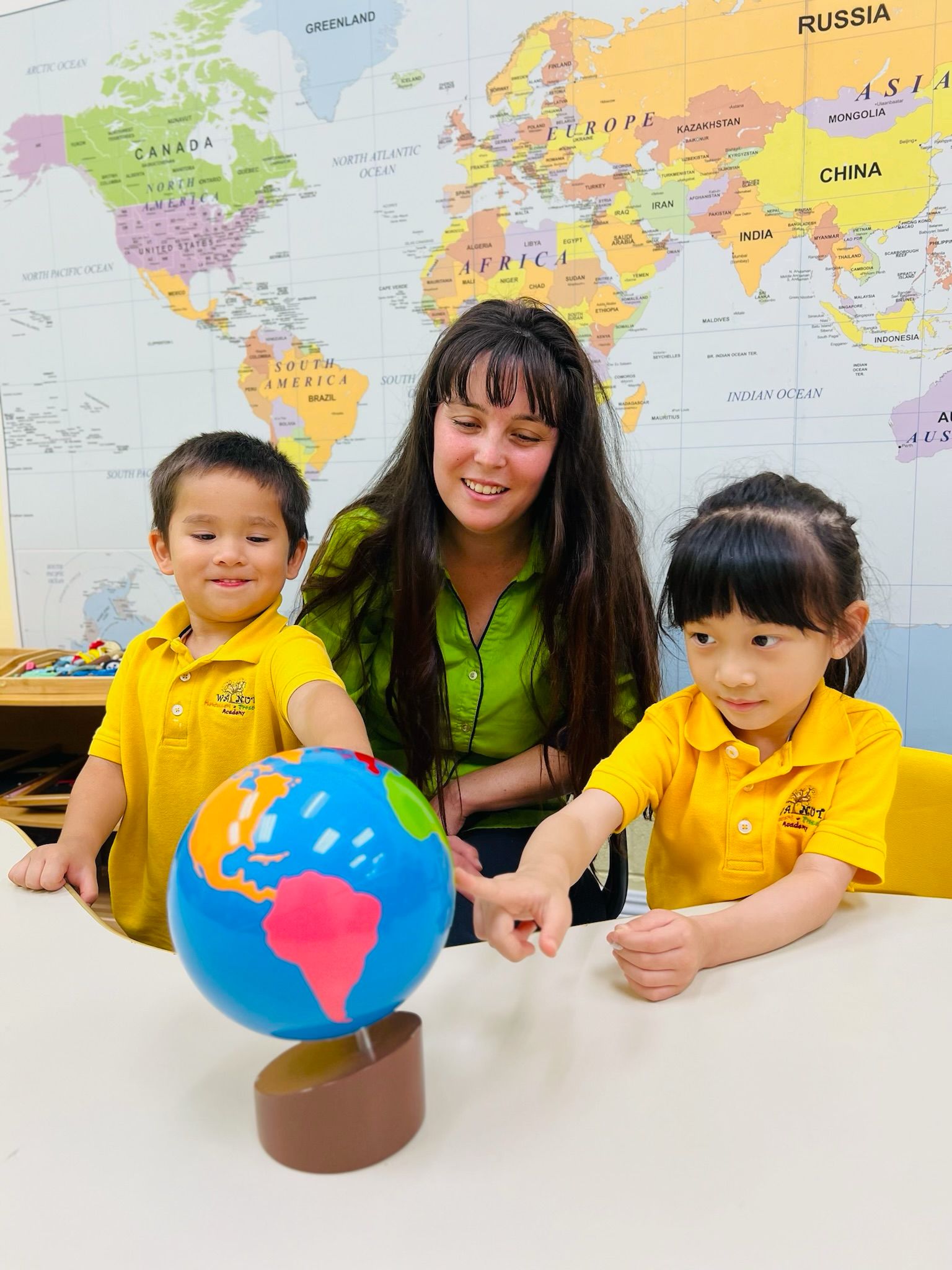 Teacher with students at Walnut Montessori